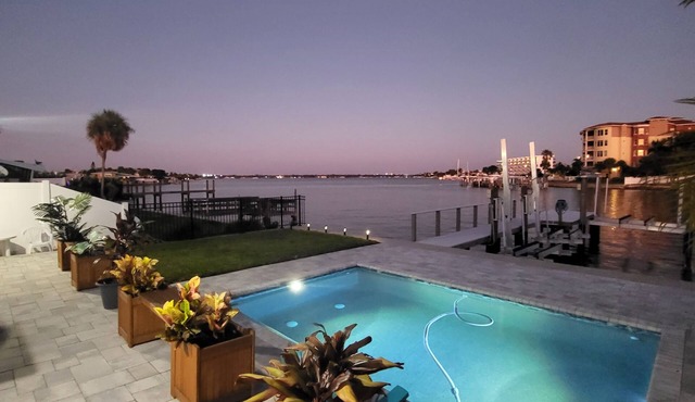 Million Dollar Views! Waterfront 2 bedroom/2 bath duplex with pool and dock.
