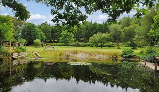 Millpool Lodge peaceful haven with 3 acre stunning gardens waterfalls and hottub