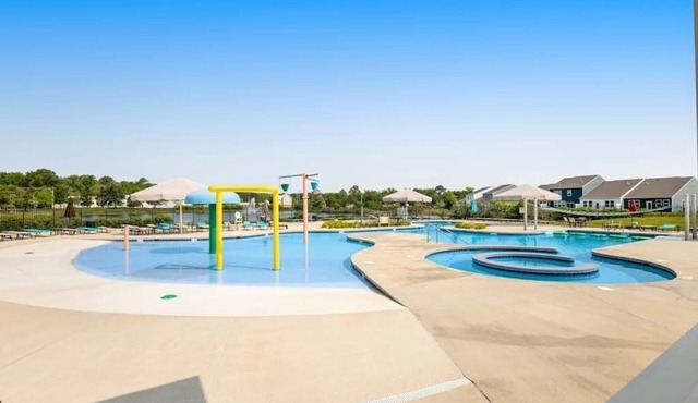 Millville by the Sea townhome with clubhouse, pools & wellness center access
