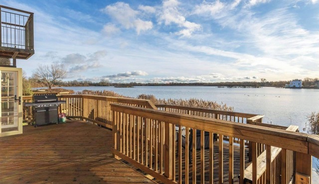 Milly Cottage on the prestigious Lower Mill Estate is a lovely 5-bedroom lakeside retreat overlookin