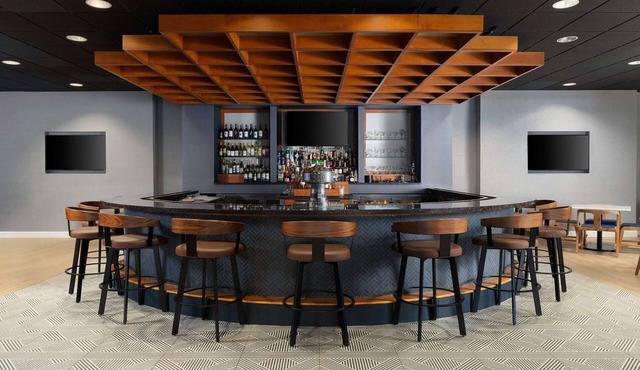 Minutes to Pimlico Race Course + Dining & Fitness