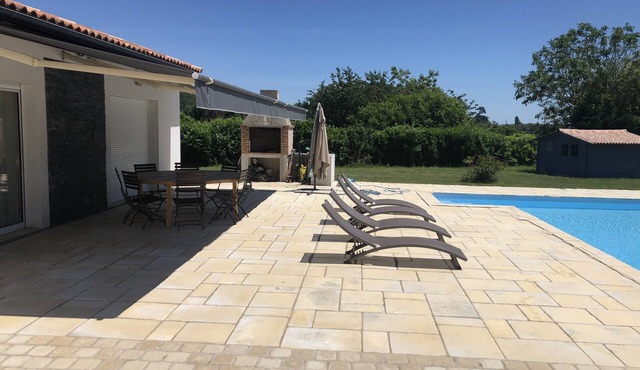 Modern 4 bed villa, air-con in living area, fabulous terrace/garden, large pool.