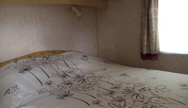 Mobil Home in wooded grounds quiet location south facing altitude 485.Aspet 5 km