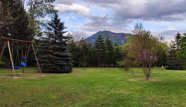 Mobil home sur grand terrain clôturé et arboré