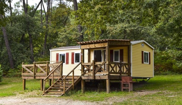 Mobile home near a fishing pond