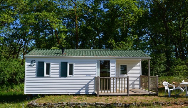 Mobile home on a farm with swimming pool