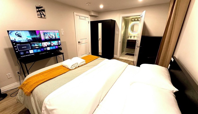 Modern 1 bedroom 1 full bathroom walk out unit Near Fairview mall & Airport