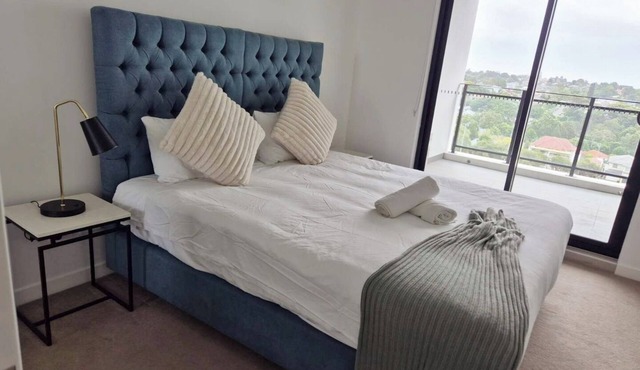 Modern 1BR + Study | 5 Min to Train | Free Parking