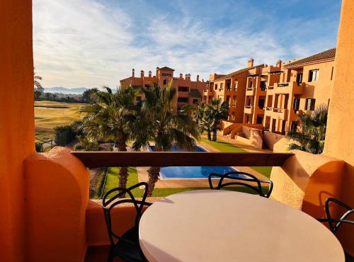 Modern 2-bedroom apartment with best golf views & pool