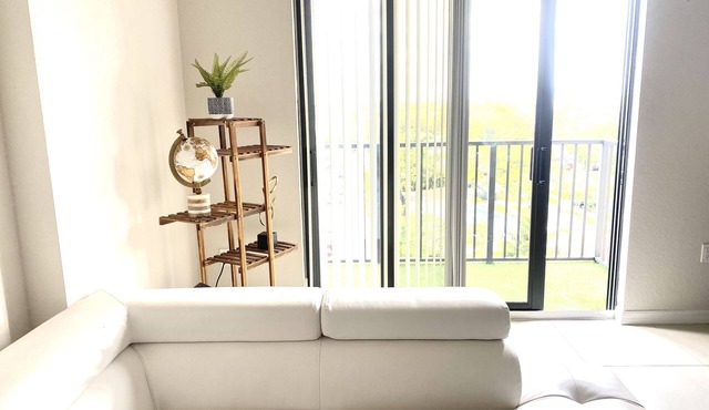 Modern 2 BR condo with downtown and city views