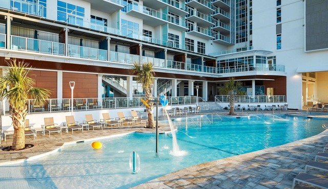 Modern 2-Room Ocean View Suite with Balcony and Spacious Living Area