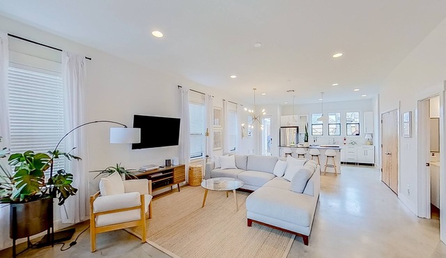Modern 2-story dog-friendly condo with quaint patio, central AC & washer/dryer