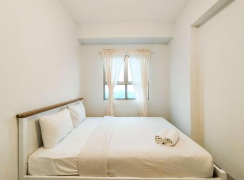 Modern 2BR at Mekarwangi Square Cibaduyut Apartment By Travelio