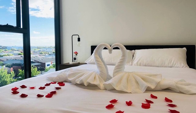 Modern 2BR City Apartment with Pool & Gym