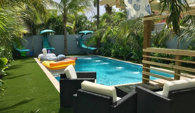 Modern 2BR Oasis Heated Pool Near Downtown