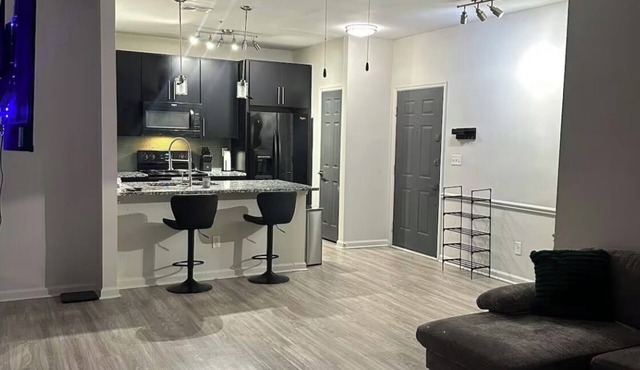 Modern 2BR Retreat Near Downtown Pool, Gym & Free Parking
