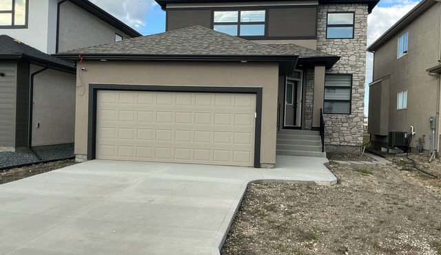 "Modern 2BR Suite with Private Entrance, Workspace, A/C & Parking in Sage Creek"