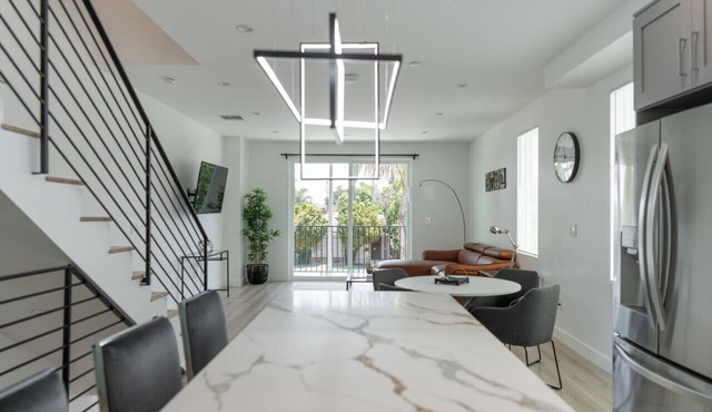 MODERN 3-4 BR TOWNHOME BUILT 2023 w/OFFICE, BONUS ROOM, GARAGE & EV CHARGER p64