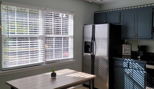 Modern 3 bdrm home with a great view of a pond