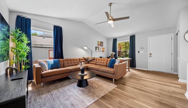 Modern 3 bed,2 full bath Escape w/Game Room and Huge Fenced Yard
