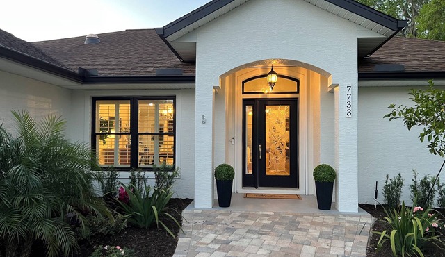 Modern 3-bedroom home close to WEC with a beautifully furnished home and patio