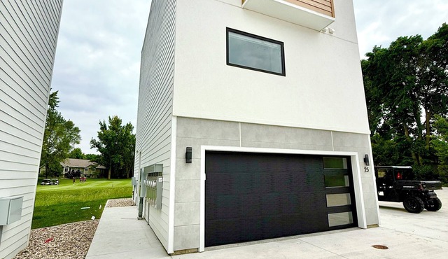 Modern 3-Story Condo Across from Arnold’s Park – Walk to Fun, Lake, & Dining!