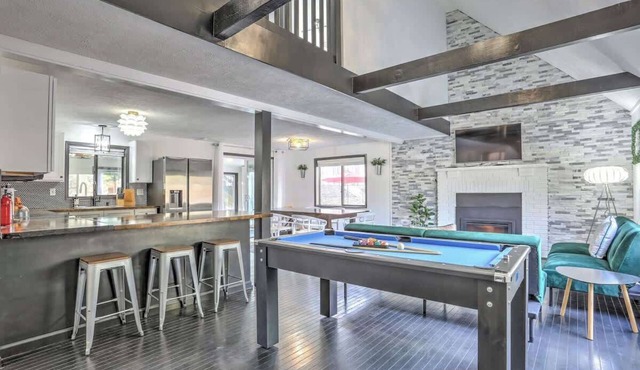 Modern 4 Bedroom Home with Sauna and Game Room in Gated Lake Community