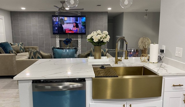 Modern 4 bedroom home with pool. Sleeps 10-12 comfortable.