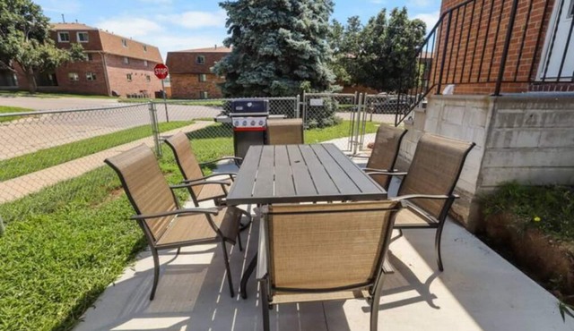 Modern 4BR Duplex Near Dodge, Garage, Fenced Yard, EV Charger, W/D
