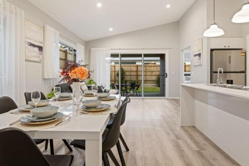 Modern 4BR Home Peaceful Logan Reserve Stay