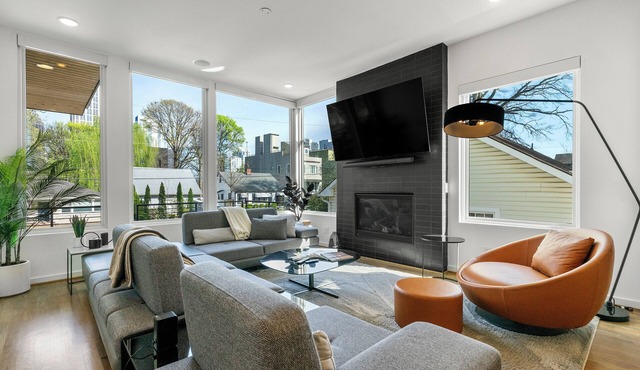 Modern 4BR Home, Skyline Views, Prime Location.