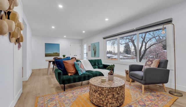 Modern 4BR | Main Floor King | Central + Parking