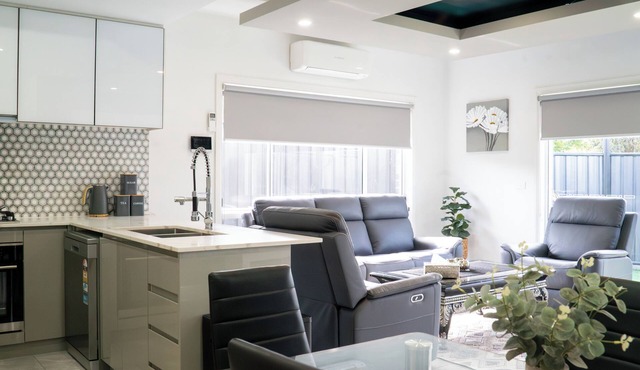 Modern 4BR Near Shops, Airport & Walking Trail