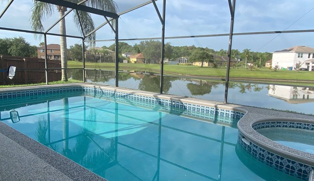 Modern 5 bedroom villa with private pool/lake view/30 mins from Disney