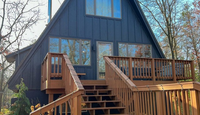 Modern A-Frame on fenced, wooded Lot. Pet friendly!