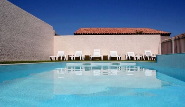 Modern, air-conditioned house with large private terrace and shared swimming pool