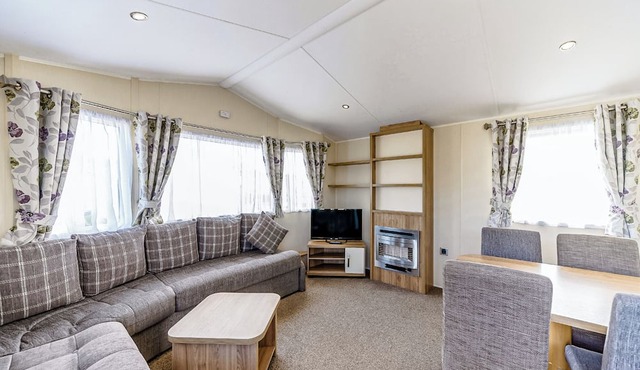 Modern and contemporary 12ft-wide caravan with two twin.