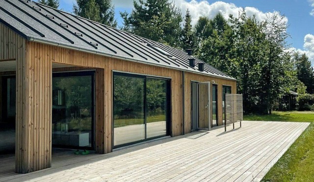 Modern and idyllic holiday home with forest views