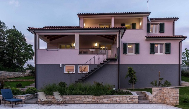 Modern and luxury house, situated on a private plot with large garden and pool