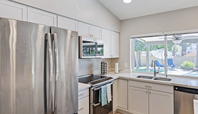 Modern and Stylish Remodeled 4 Bdrm w/HTD Pool!