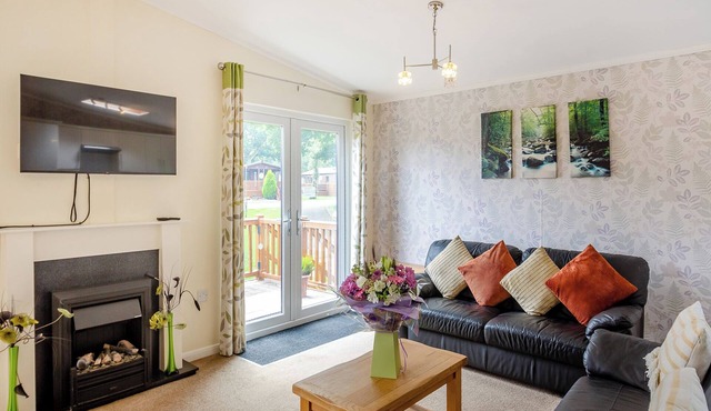 Modern and stylish timber clad holiday home with one double and two twin.