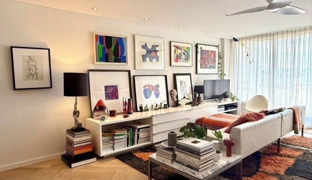 Modern, art filled apartment, central location, 2 minutes from train station