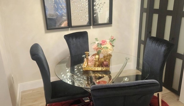 Modern Basement Suite King Bed and 100” TV