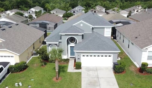 Modern, beach themed newly remodeled 6 bedroom home, only 3 miles from Disney!