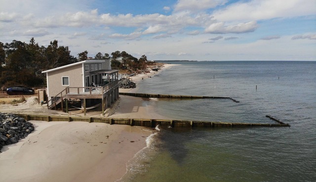 Modern Beachfront Cottage with Endless Bay Views
