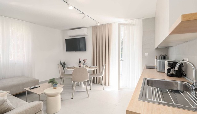 Modern City Escape - Two Bedroom Apartment with Balcony