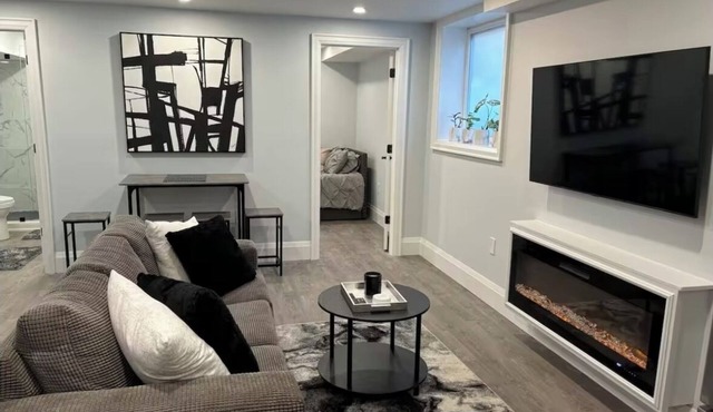 Modern, clean, bright two bedroom lower level look out duplex with large windows