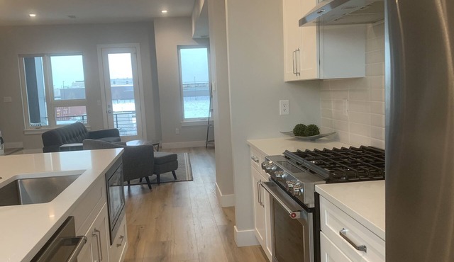 "Modern Convenience: Stunning 2-BR Townhome”