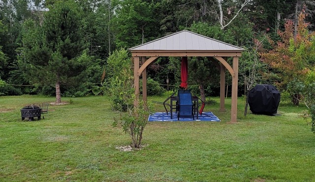 Modern Costa Del Sol Flat Overlooking Pokemouche River, with swimming off dock.n