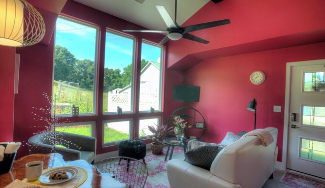 Modern country cottage that is dog friendly with a fenced-in yard.